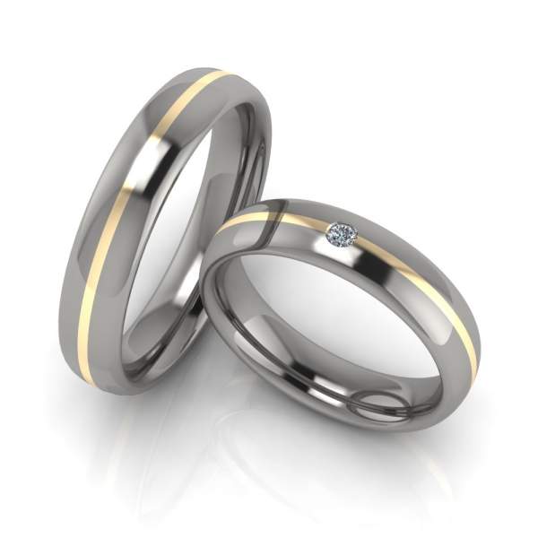 Trauringe aus Titan und 333 Gelbgold mit Gravur finden Sie in unserem Trauringshop