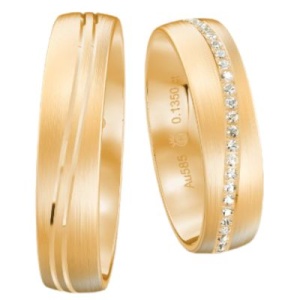 Eheringe in Roségold mit Fugen und Diamanten