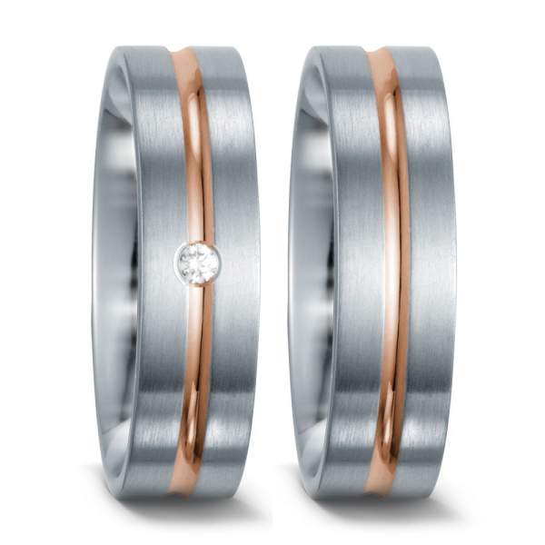 Moderne Trauringe aus Edelstahl mit Rotgold und Brillant in der Mitte von TitanFactory