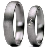 Partnerringe aus Tantal mit 6 Diamanten im Brillantschliff Partnerringe aus Tantal mit 6 Diamanten im Brillantschliff