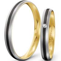 Trauringe Platin-Gelbgold (600/585) Carbon mit Brillant 0,01 ct. Trauringe Platin-Gelbgold (600/585) Carbon mit Brillant 0,01 ct.