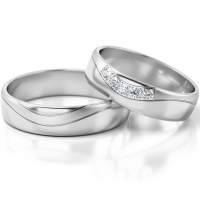 Trauringe Weissgold (333) mit Brillant 0,075 ct. Trauringe Weissgold (333) mit Brillant 0,075 ct.