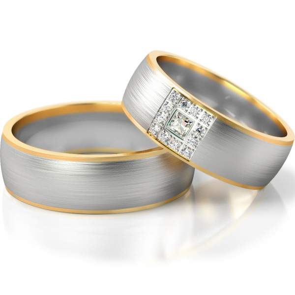 Trauringe Gelbgold-Weissgold (333) mit 12 Brillanten à 0,01ct. & 1 Princesscut-Diamant 0,04ct.